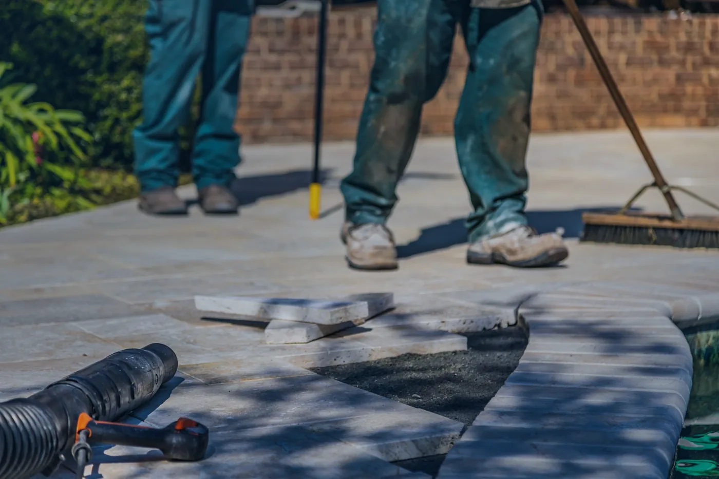 Sheet flooring being laid over a prepared surface